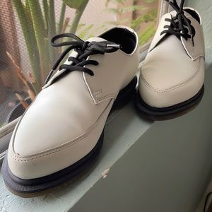 Dr. Martens white leather shoe w/black laces